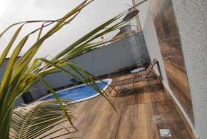 Casa alto padrão em bairro nobre de Caldas Novas com piscina quente e sala de jogos